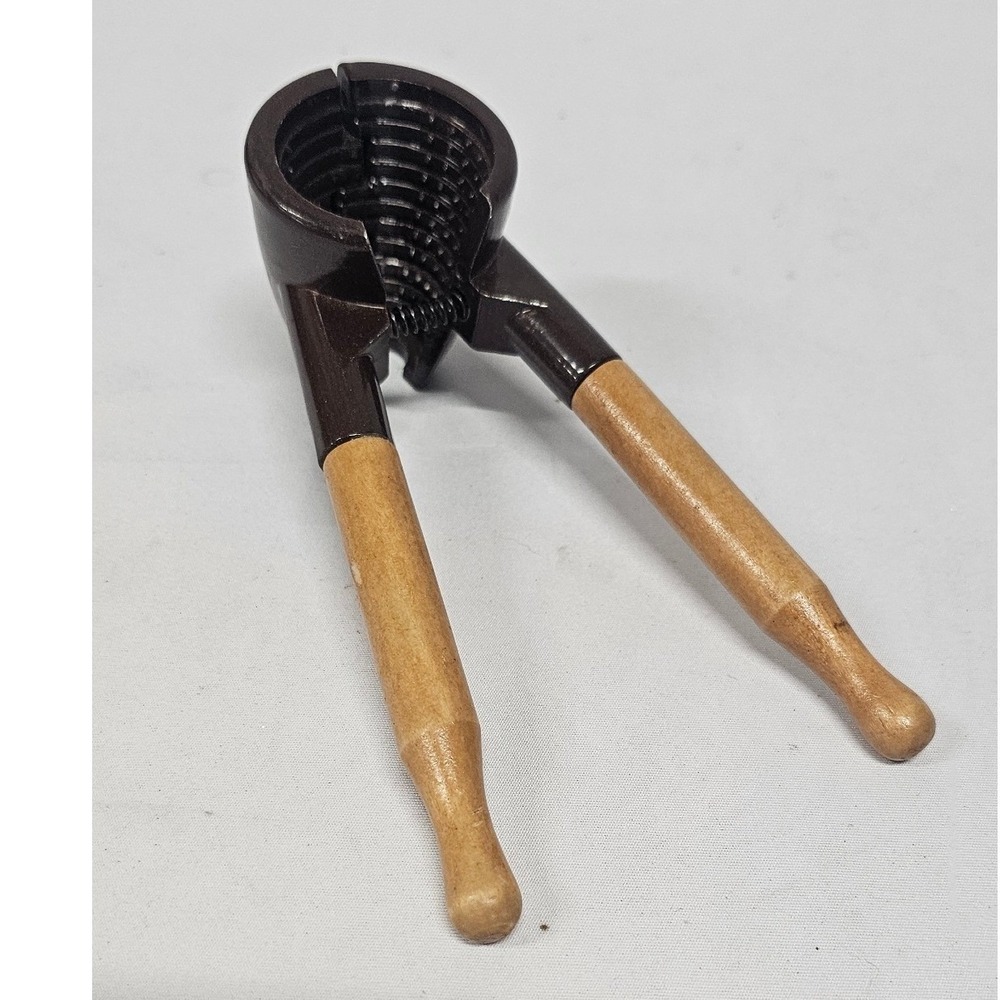 Vintage Funnel Nutcracker Brown Cast Metal Spring Loaded Wooden Handles